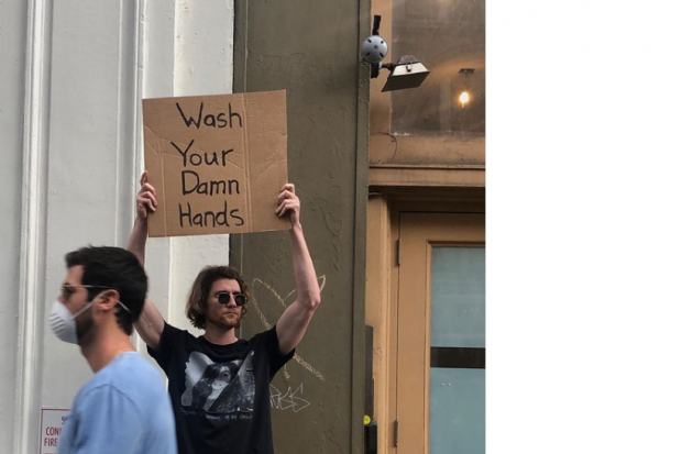 Dude with sign