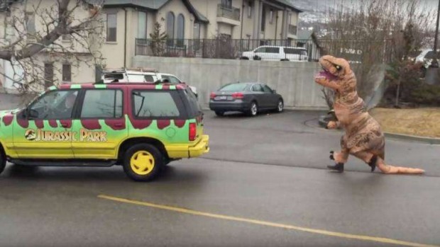 Man Wears T-rex Costume