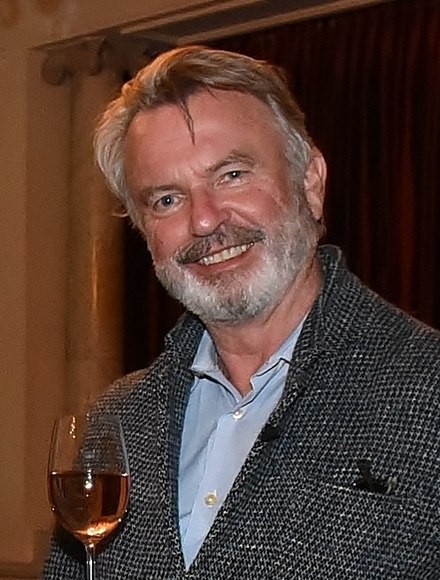 New Zealand Government, Office of the Governor-General, Sam Neill 2017 (cropped), CC BY 4.0