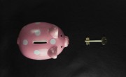 piggy bank with key
